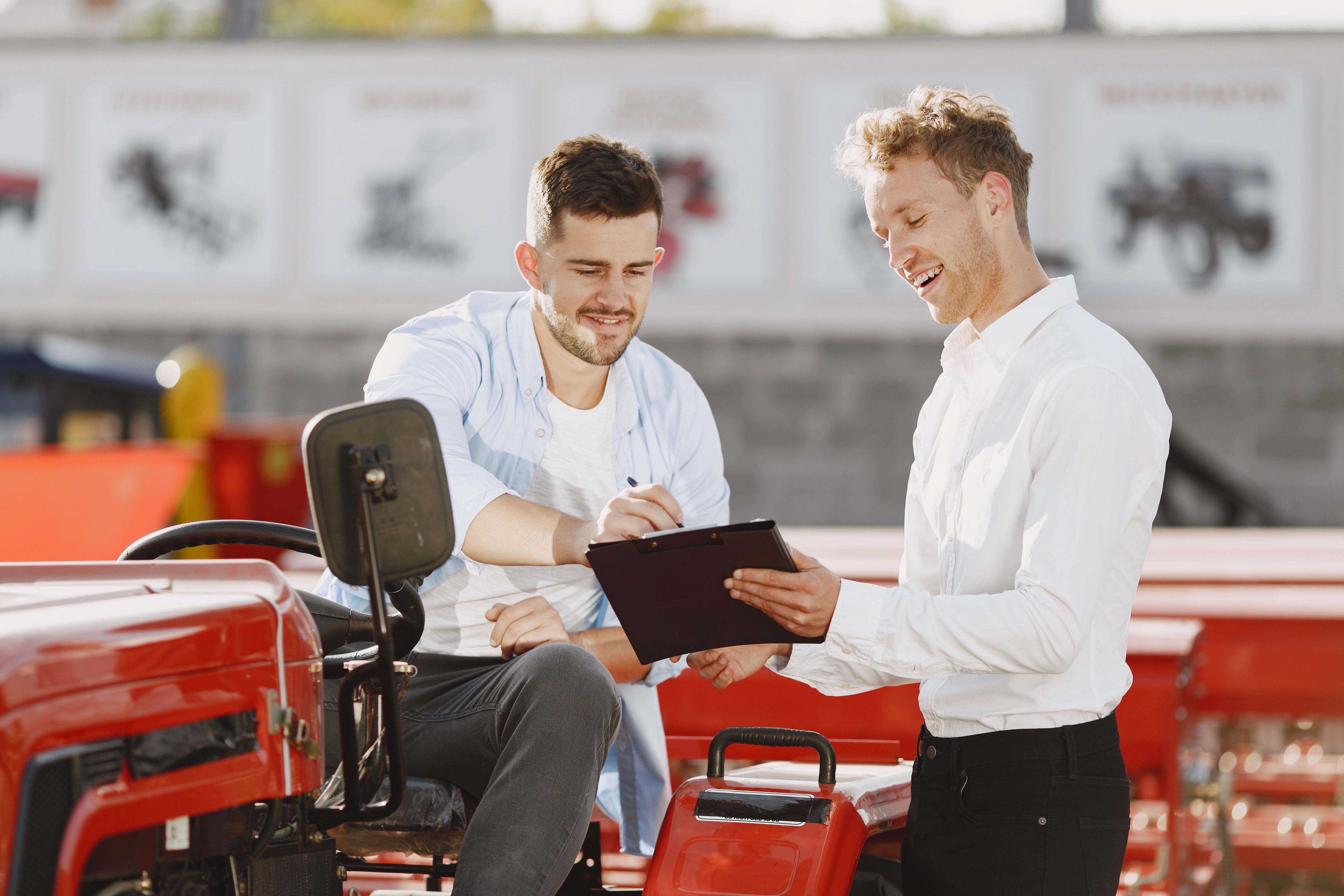 Small business owner reviewing paperwork while purchasing equipment eligible for the Section 179 deduction